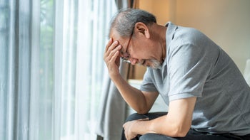 Medication Education: Side Effects: senior man headache 1323957284