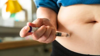 zepbound: closeup administering injection pen 2226631653