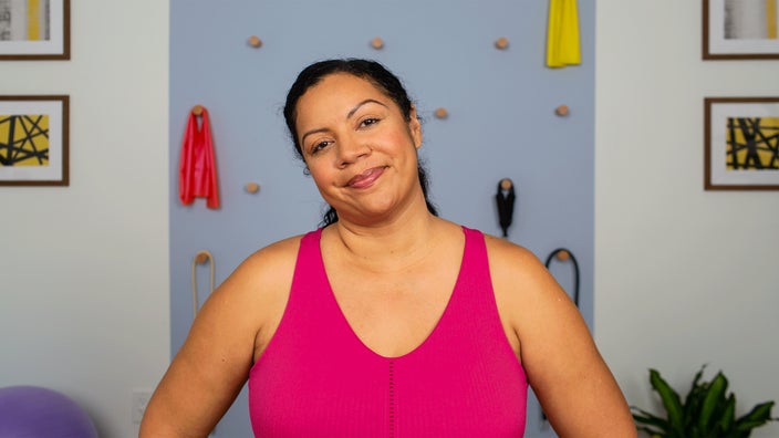 Woman demonstrating side bend neck exercise