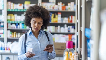 Health: Acetylcysteine: woman at pharmacy 1161657610