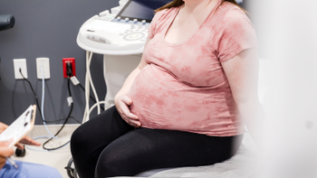 Pregnancy: pregnant woman at medical appointment 2205730171