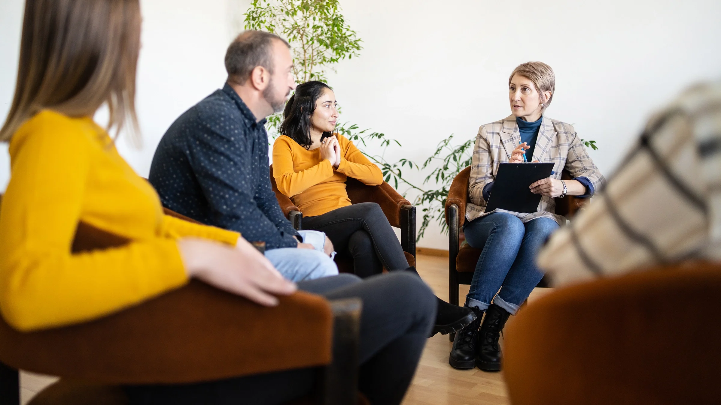 People meet up during a group therapy session.