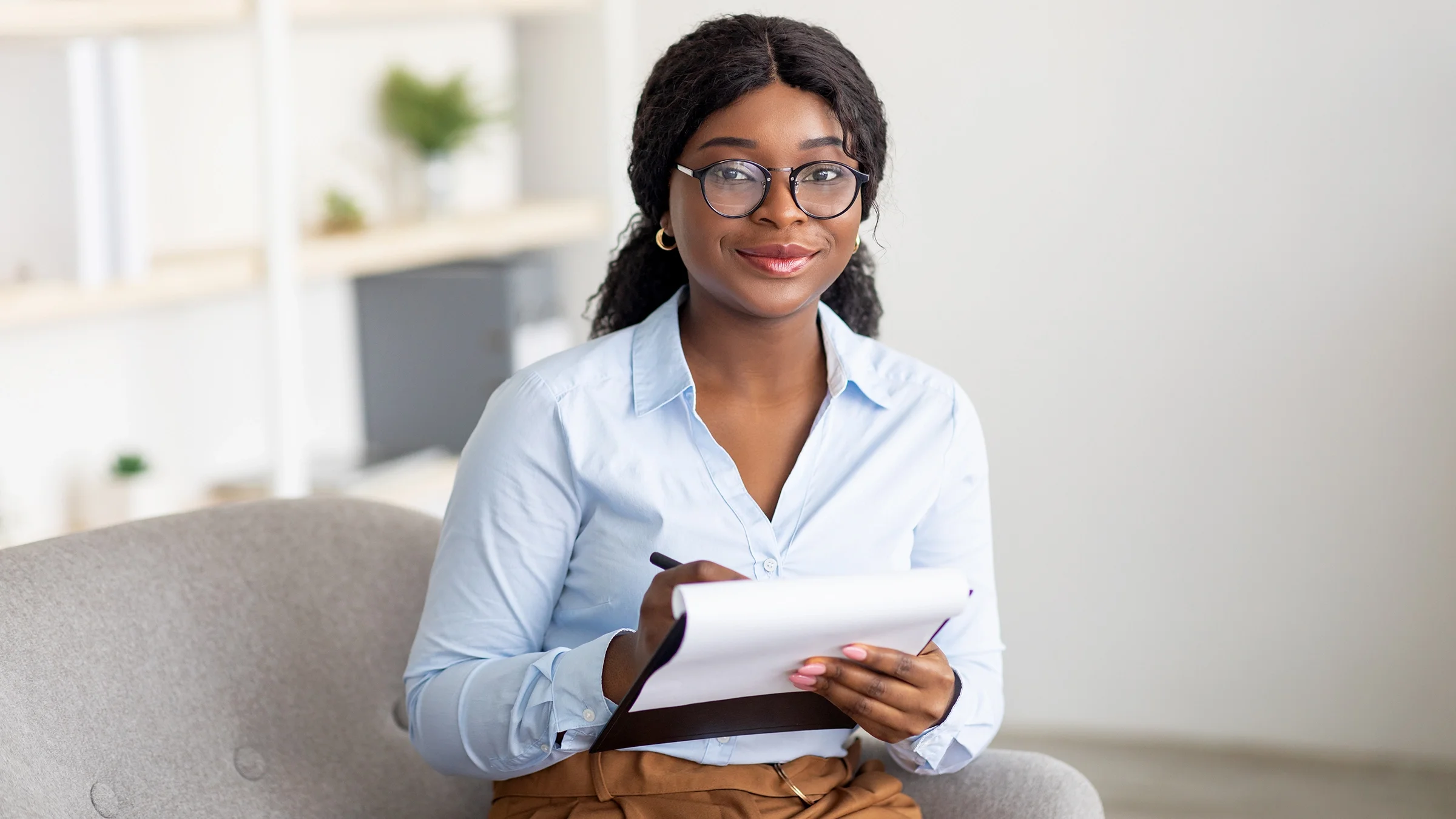 A psychiatrist writes a prescription.