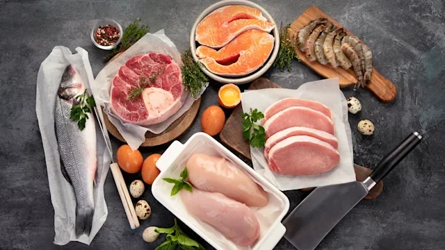 diet-nutrition: overhead view of meat and eggs 1336040395