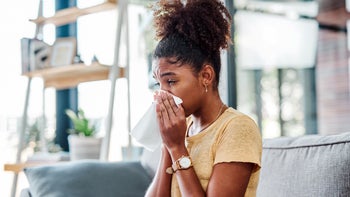 Allergies: Cold: woman blowing her nose 1306632935