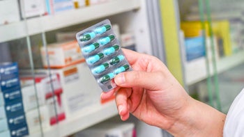 Health: Parenthood and pregnancy: antibiotic blister pack medication wall behind 943974286