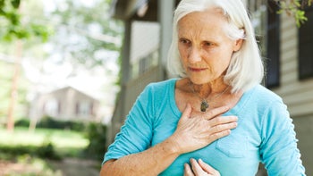 Health: Digestive: senior woman chest pain-171578741