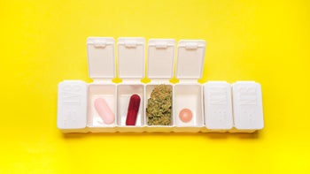 Cannabis: med organizer with cannabis pills 1366681761