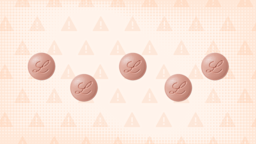 In the center of a light orange background with texture and warning sign pattern is a row of Foundayo pills.
GoodRx Health, Courtesy of Eli Lilly and Company