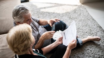 Invokana: senior couple paying finances 376529801