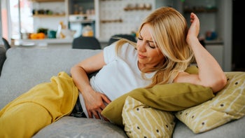 UTI: woman with stomach pain 1250173635