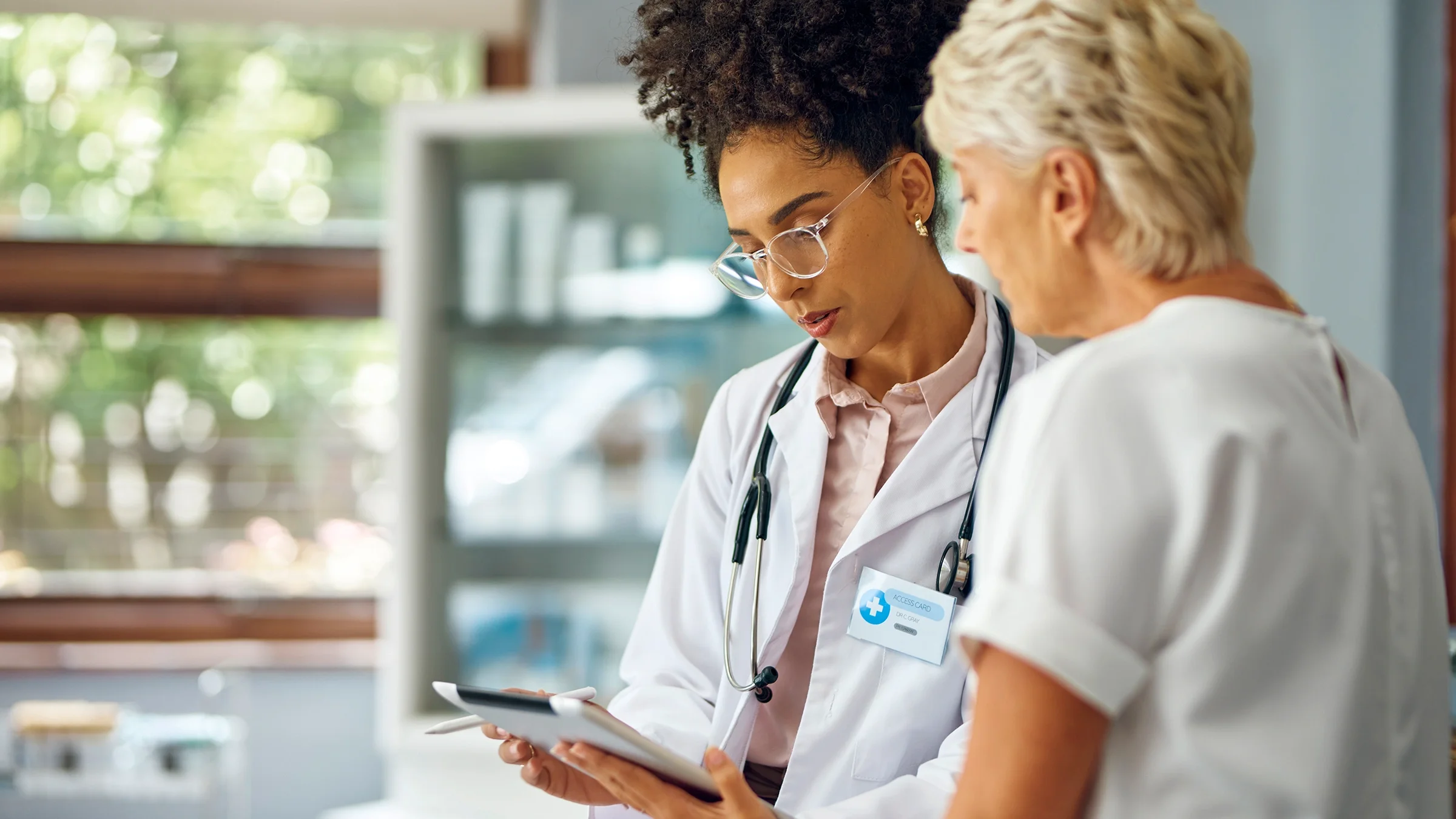 A patient discusses a test result with a healthcare professional.