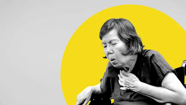 Side effects: Medications that harm lungs: older woman coughing in wheelchair-1144590800