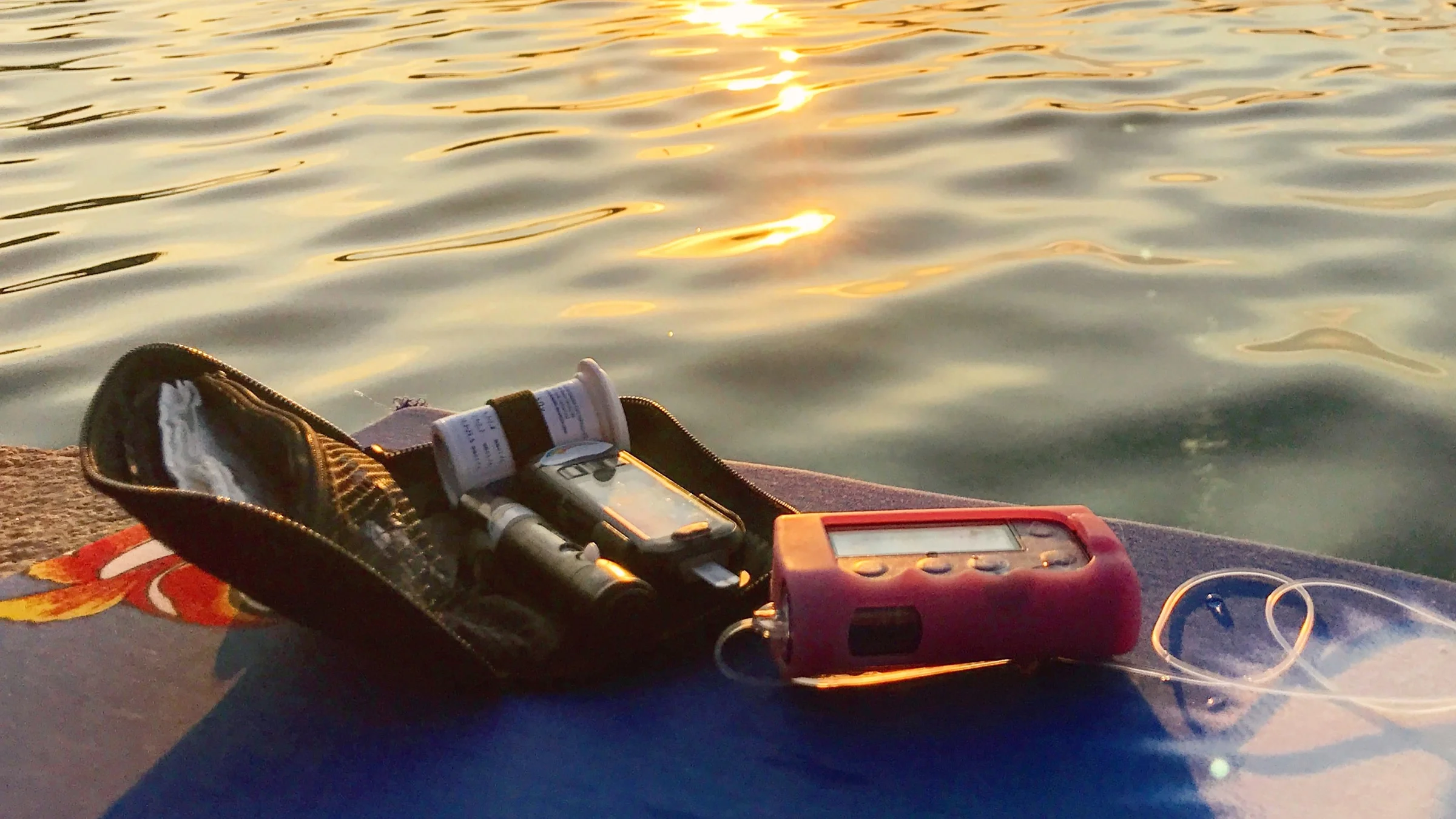 Diabetes management supplies by the beach.