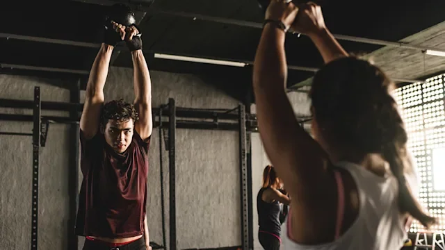 Movement-exercise: kettlebell exercise at gym 1151403433