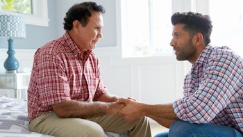 senior health: Alzheimers: adult son father aging-519664446