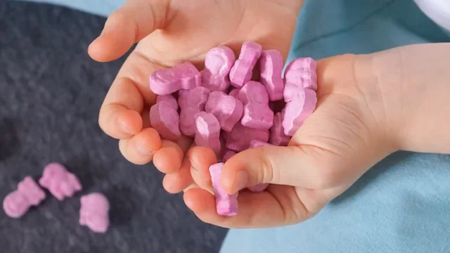 Vitamins: Supplements and Herbs: closeup hands holding vitamins 1410637077