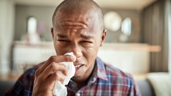 Allergies: man with nasal congestion 928362760