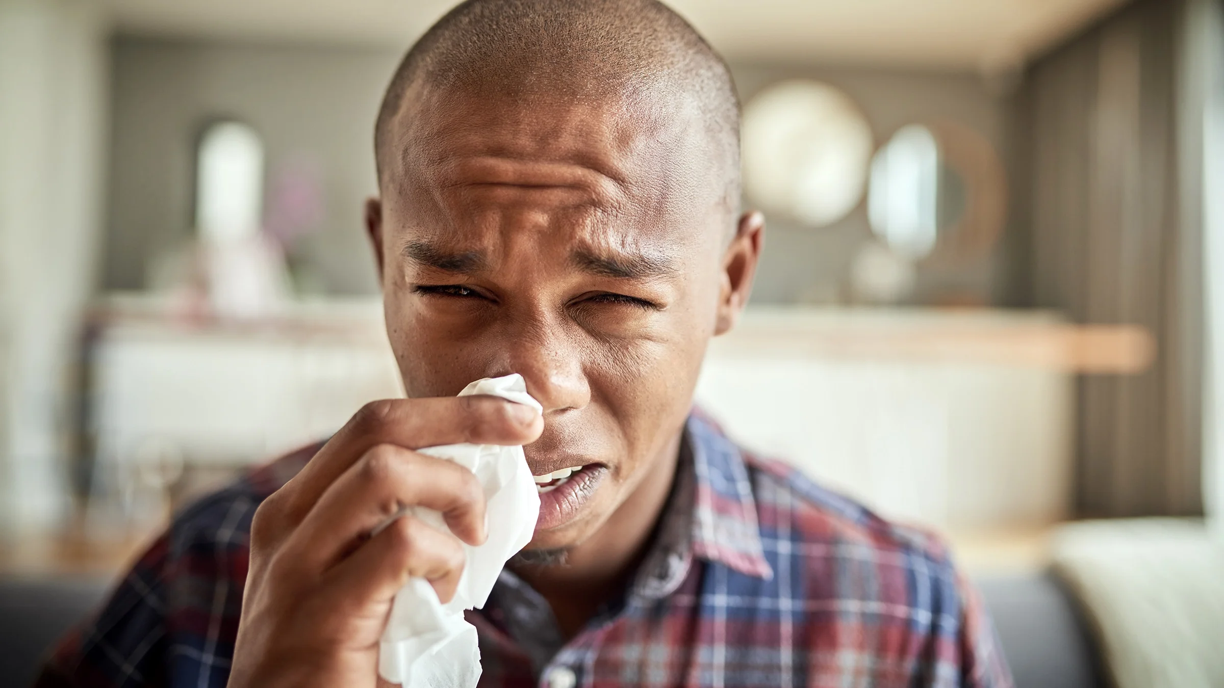 A man appears to have a congested nose.