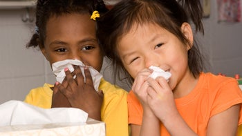 Flu: Contagious: two kids blowing nose 186815294