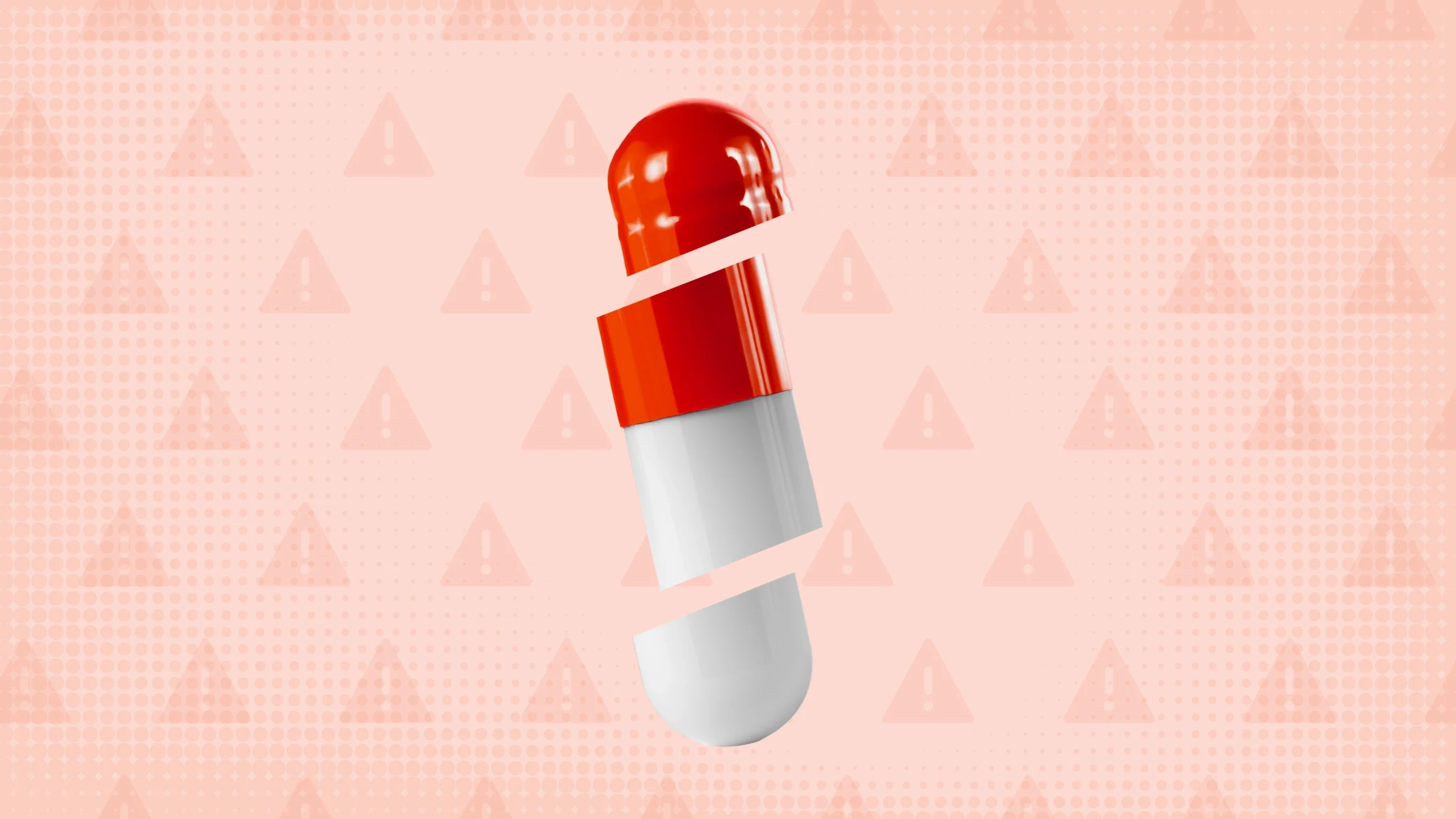 Light red background with texture and warning sign pattern. In the center is a white and red capsule pill cut into thirds.