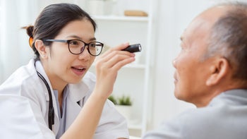 eye: eye exam: doctor: vision: doctor checking patients eyes-903513284