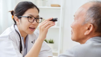 eye: eye exam: doctor: vision: doctor checking patients eyes-903513284
