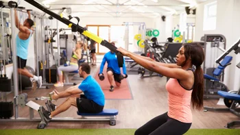 fsa-hsa: woman exercising with TRX 481451218