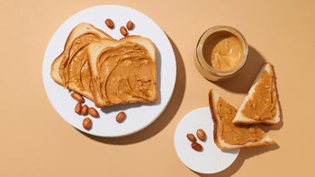 Diet and nutrition: jar of peanut butter and toast 2213828511