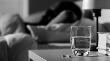 glass of water and medicine-1127272746