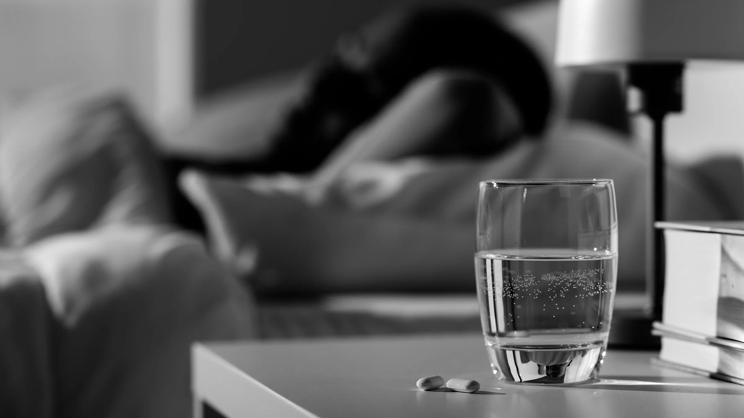 glass of water and medicine-1127272746