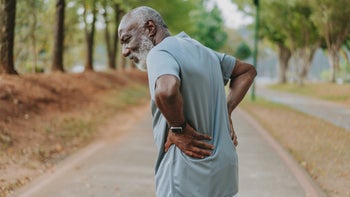 Heart-attack: senior man with back pain 1726381973