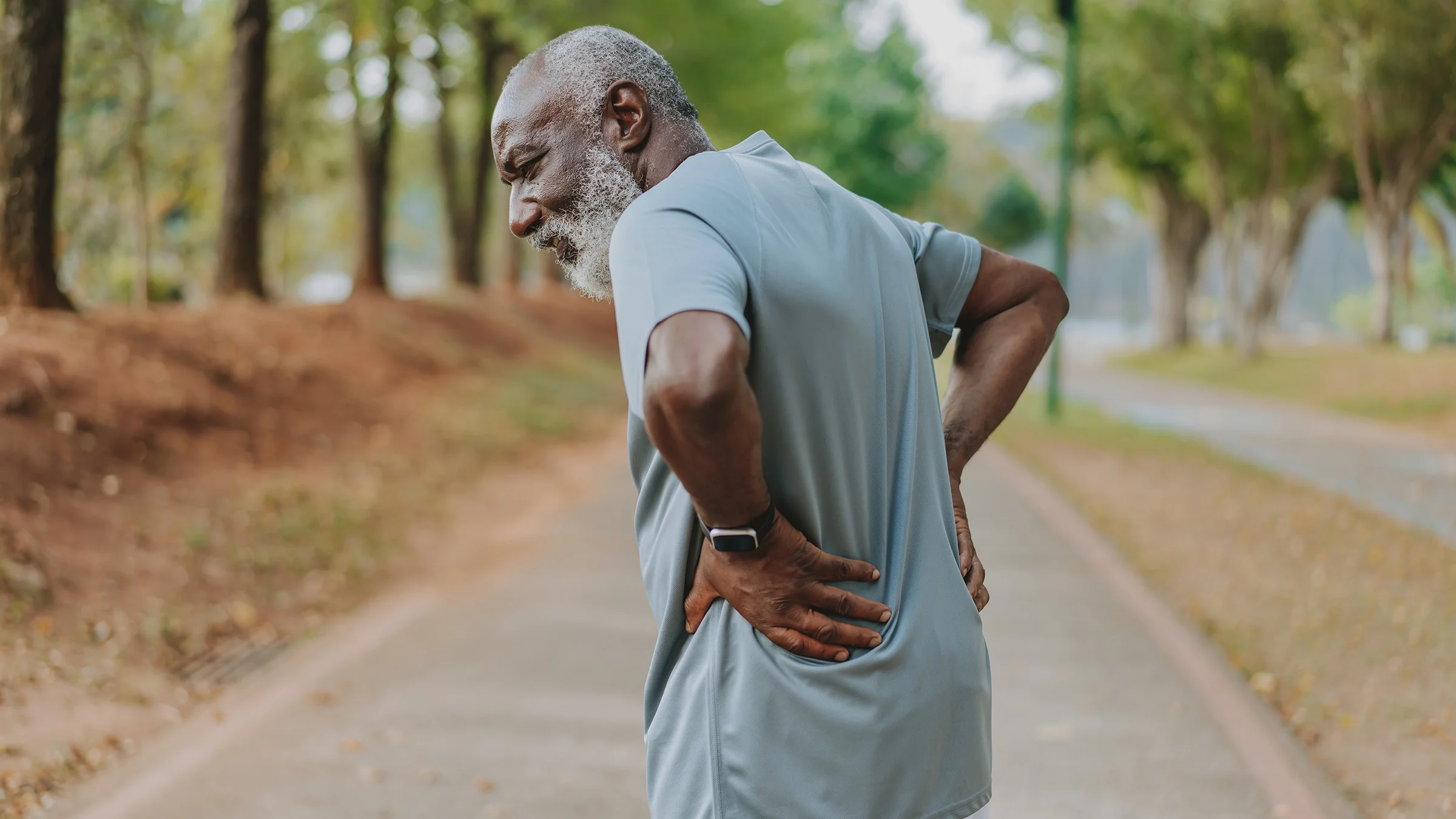 Older man with back pain.