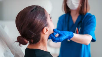 HCP: Endocrinology: closeup thyroid checkup 2213405724