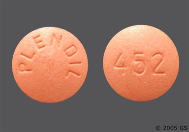 Red-brown Round PLENDIL - Felodipine 10mg Extended-Release Tablet
