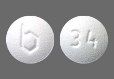 White Round 34 And B - Mimvey 1mg-0.5mg Tablet