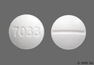 White Round 7033 - Fludrocortisone Acetate 0.1mg Tablet