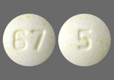 Yellow Round 67 And 5 - Olanzapine 5mg Tablet