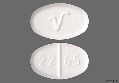 White Oval 22 65 And V - Baclofen 10mg Tablet