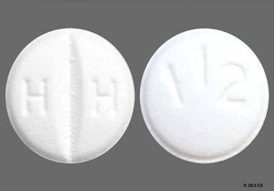 White Round 112 - Losartan Potassium 50mg Tablet