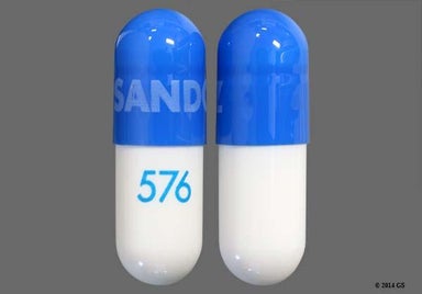 Blue And White Sandoz 576 - Calcium Acetate Gelcaps 667mg Capsule