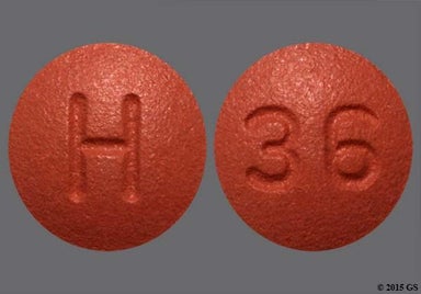 Brown Round 36 And H - Finasteride 1mg Tablet