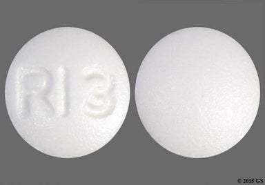 White Round RI3 - Risperidone 1mg Tablet
