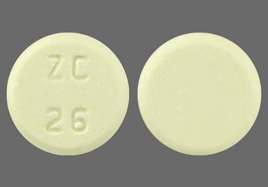Yellow Round ZC 26 - Meloxicam 15mg Tablet