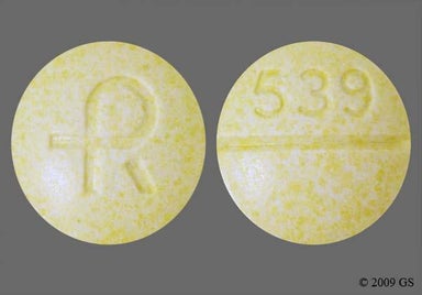Yellow Round LOGO - Carbidopa/Levodopa 25mg-100mg Tablet