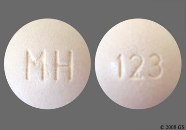Beige Round Mh And 123 - Ergotamine Tartrate/Caffeine 1mg-100mg Tablet