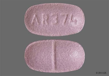 Purple Oblong AR374 - Colchicine 0.6mg Tablet