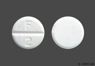 White Round F2 - Sodium Fluoride 1mg Chewable Tablet
