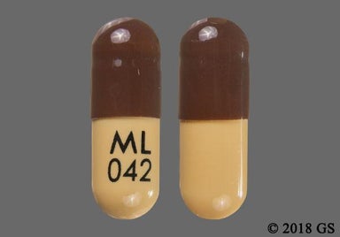 Brown, Yellow Capsule ML 042 - Doxycycline Monohydrate 100mg Capsule