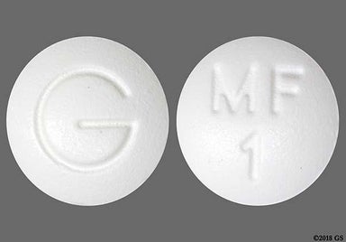 White Round MF 1 - Metformin Hydrochloride 500mg Tablet
